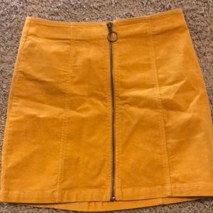 yellow zip up skirt